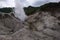 Smoke vents escaping from the earthâ€™s surface in Hell Valley Jigokudani