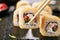 Smoked Chicken Tempura Uramaki Sushi Rolls on Black Background