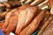 Smoked fish lying on the counter on the street market