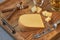 Smoked Gouda Cheese Wedge on Wooden Tray