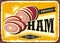 Smoked ham advertising with sliced ham on old rusty yellow background