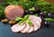 Smoked ham with herbs, fruits plumps