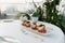 Smoked meat, sesame cheese ball and tapioca chips dish on table