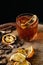 Smoked old fashioned cocktail on dark wooden background