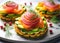 Smoked salmon with avocado and red onion on potato cakes