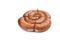 Smoked sausage twisted in a spiral and bound with a beechnut, isolated on a white background