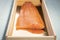 Smoked wild sockeye salmon inside wooden case