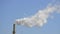 Smokestack in Blue Sky from Factory in Reverse Motion