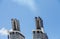 Smokestacks on Cruise Ship in Blue Sky