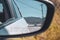 Smokey mountains through a rear veiw car mirror