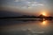 Smokey sunset over Sutter Buttes in Northern California