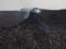 Smoking volcanic pinnacle close to Erta Ale volcano, Ethiopia