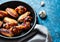 Smoky roast chicken wings in cast iron pan