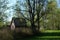 Smolensk, Russia - May 2023. Wooden house in the village in the middle of the forest.