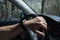 Smolqn, Bulgaria - march 22, 2019 - Man driving Audi, transportation concept, hands holding steering wheel white driving,road