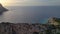 Smooth aerial view flight drone Sunset cliff Ibiza pirates island tower Spain