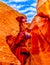 The smooth curved Red Navajo Sandstone walls at the entrance to the Upper Antelope Canyon