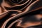 Smooth elegant chocolate brown color silk or satin cloth texture. Abstract background.