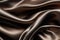 Smooth elegant chocolate brown color silk or satin cloth texture. Abstract background.
