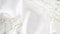 Smooth elegant white silk or satin luxury cloth texture. Tender wedding background. Luxurious background design. Copy space