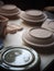 Smooth form beige soft brown color ceramic utensils bowls under production process in a factory