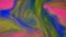 Smooth liquid gradient colorful paints moving slowly. Stock footage. Close up of rainbow color inks mixing in liquid