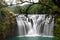 Smooth long exposure of Taiwan`s beautiful Shifen Falls in Pingxi District
