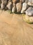 smooth polished multicolored stones washed ashore on the beach