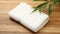 Smooth And Polished White Towel Near Bamboo Plant