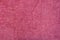 Smooth seamless texture of a terry towel. Pink color