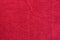 Smooth seamless texture of a terry towel. Red color