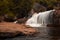 Smooth and silky flow of water in Thirumoorthy Falls also knows as Panchalingam Falls in tamil language, Udumalpet, Tamil Nadu,