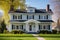 smooth stucco siding on a colonial revival mansion