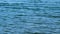 Smooth Swaying Of Waves. Beautiful And Fresh Blue Wavy Water. Calming Effect Of Water Movement. Close up.