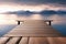 Smooth wooden platform set against tranquil ocean backdrop. embraced by distant smoky mountains. for product showcases