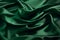 Smooth wrinkled silk bedsheet, fabric background. Abstract crumpled satin texture. Dark deep green color. Folded cloth, wallpaper