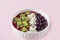 Smoothie bowl with acai, banana, blueberries, kiwi fruit and black currants. Healthy super food with fresh fruit. Vegetarian and