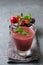 Smoothie with cherry in a glass