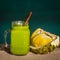 Smoothies from avocado, banana, mango, dill in glass and piece of durian on the table, morning light, close up