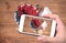 Smoothies with oatmeal ,berries in glass jars on a wooden background.