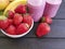 smoothies strawberry banana nutrition apple dessert on a black wooden background