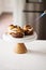 Smores donuts on a cake stand