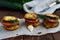 Snack in the form of a sandwich cutlet, fried zucchini, fresh tomatoes and greens.