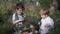 Snack, hungry kids have fun eat baking and drink milk from a glass jar