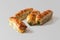 Snack of puff pastry rolls with a golden crust stuffed with spinach and cheese