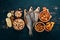 Snacks for beer. Salted crackers, Dried Fish, Chips, Nuts, Peanuts, Pistachios. On a wooden background.