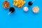 Snacks for TV watching. Chips, nuts, soda, rusks on blue background top view space for text