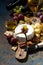 snacks, wine and Camembert cheese on a dark background, vertical