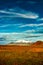 Snaefellsjoekull mountain peak and Icelandic colorful and wild landscape with clouds twist and play at summer time, Iceland,