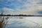 Snagov lake during wintertime.Cloudy day.Gorgeous landscape.Frost on the surface